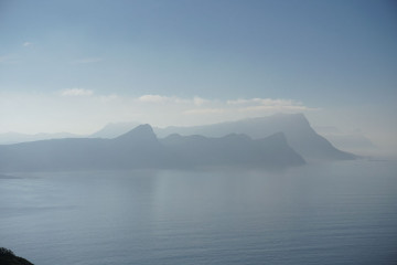 Hazy shore cliffs